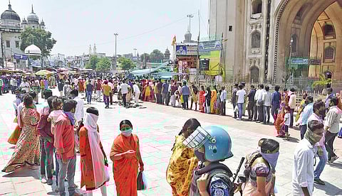 Devotees queue up in front of the Bhagyalakshmi temple near Charminar on Friday.