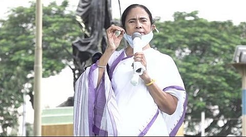 Bengal CM Mamata Banerjee speaking during the protest march in Kolkata (Photo | Twitter/@AITCofficial)