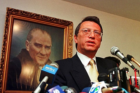 Former Turkish PM and veteran politician Mesut Yilmaz speaks to journalists after a meeting in Ankara, Turkey in 1997 (Photo | AP)