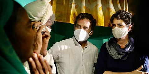 Congress MP Rahul Gandhi and his sister Priyanka Gandhi meet the Hathras rape victim’s family at their house. (Photo | Special arrangement)