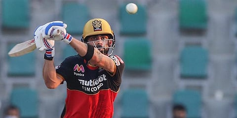 Royal Challengers Bangalore skipper Virat Kohli plays a shot during IPL 2020 cricket match against Rajasthan Royals at Sheikh Zayed Stadium. (Photo | PTI)