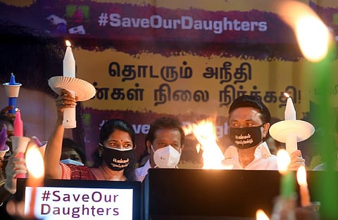 DMK chief Stalin and women wing president Kanimozhi during the candlelight vigil to protest the Hathras gang rape incident in Chennai. (Photo | Martin Louis, EPS)