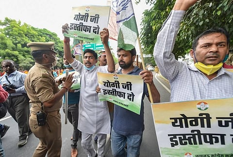 Congress party workers stage a protest demanding the transfer of Hathras district Magistrate Praveen Kumar Laxkar. (Photo | PTI)