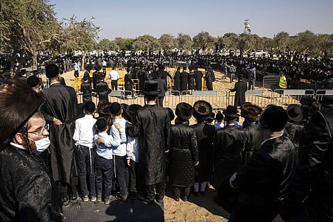 Large numbers of ultra-Orthodox Jews gather for the funeral for Rabbi Mordechai Leifer, in the port city of Ashdod, Israel, Monday, Oct. 5, 2020. (Photo | AP)