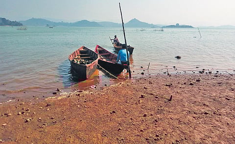 Boatmen waiting for passengers on the banks of Indravati reservoir | Express