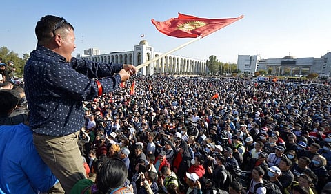 People protest during a rally against the results of a parliamentary vote in Bishkek, Kyrgyzstan, Monday, Oct. 5, 2020. (Photo | AP)