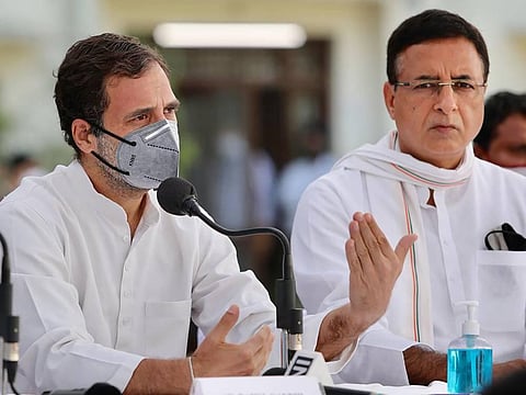 Congress leader Rahul Gandhi along with party General Secretary Randeep Singh Surjewala addresses a press conference in Patiala (Photo | PTI)