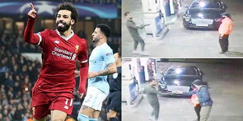 Liverpool striker Mohamed Salah helps a homeless man at a petrol station. (Photo | AP, YouTube Screengrab)
