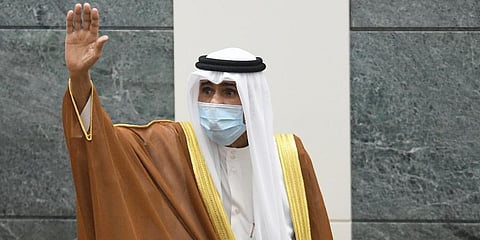 The new Emir of Kuwait Sheikh Nawaf Al Ahmad Al Sabah, waves after he was sworn in at the Kuwaiti National Assembly in Kuwait. (Photo | AP)