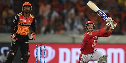 KXIP batsman Mayank Agarwal plays a shot against Sunrisers Hyderabad at Rajiv Gandhi International Stadium in Hyderabad. (File Photo | PTI)