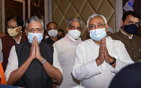 Janta Dal United National chief and Bihar CM Nitish Kumar with BJP senior leader and Dy CM Sushil Kumar Modi during a press conference in Patna (Photo | PTI)