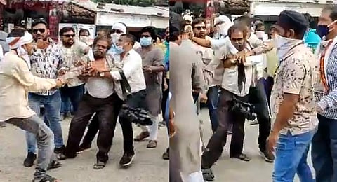Videograb of Kamal Shukla being assaulted by Congress workers on September 26.