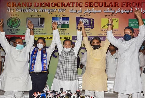 AIMIM chief Asaduddin Owaisi, RLSP chief Upendar Kushwaha, Samajvadi Janta Dal Democratic chief Devendra Yadav and BSP leaders join with hands. (Photo | PTI)