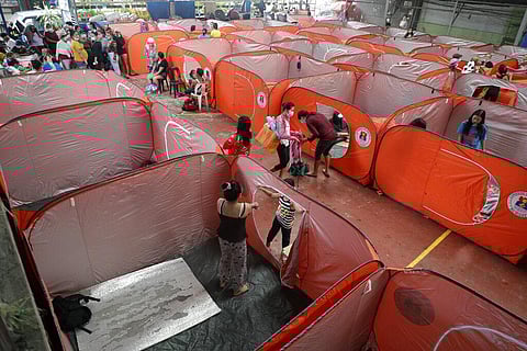 Residents occupy an evacuation center as rains from a typhoon locally known as Goni start to pour in Manila, Philippines (Photo | AP)