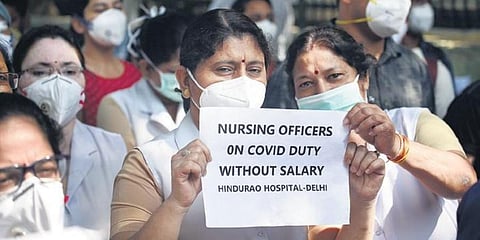 Nurses on COVID-19 duty protest against North MCD administration over non-payment of salaries at Hindu Rao Hospital. (File Photo | Parveen Negi, EPS)