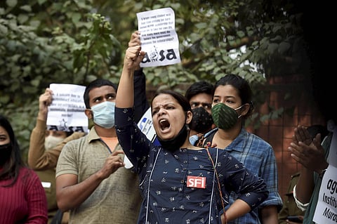 JNUSU members stage a protest in front of Lady Sriram College gate demanding justice for Aishwarya Reddy. (Photo|PTI)