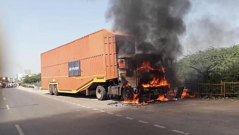 A container truck caught fire due to technical problem in the engine (Photo | EPS)