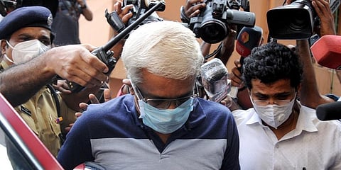 M Sivasankar enters the ED office in Kochi after being taken into custody by the central agency. (Photo | A Sanesh, EPS)