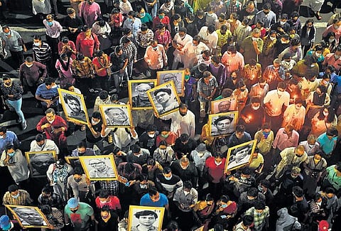 Fans attend a funeral rally for iconic Bengali actor Soumitra Chatterjee