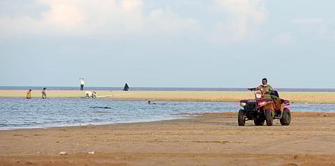 A policeman patrolling at Marina Beach. (Photo | Martin Louis, EPS)