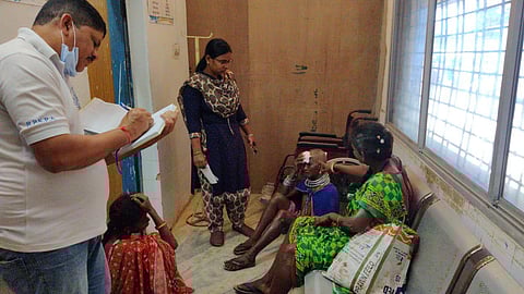 An injured woman under treatment at Khairput Khairput Community Health Centre. (Photo | EPS)