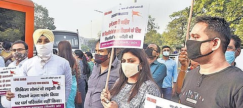 People protest at Connaught Place demanding justice for a 21-year-old student who was killed outside her college recently in Faridabad | Parveen Negi