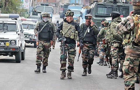 Security personnel during an encounter with militants at Rangreth on the outskirts of Srinagar on Sunday | zahoor punjabi