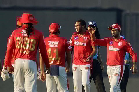 Kings XI Punjab players celebrate the wicket of Faf du Plessis of Chennai Super Kings during IPL 2020 match at Sheikh Zayed Stadium in Abu Dhabi, Sunday Nov. 1 2020. (Photo | PTI)