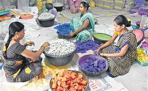 Workers involved in making of chalk pieces in Bommala colony of Tirupati. (Photo | EPS/Madhav)