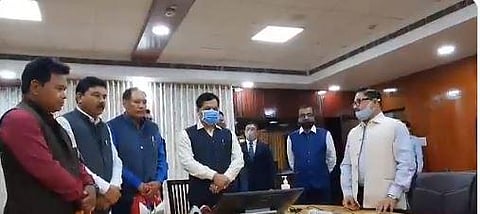 Assam Chief Minister Sarbananda Sonowal wih Biswajit Daimary and Emmanuel Mushahary. (Photo| Twitter)