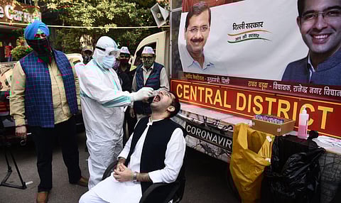 At the mobile testing van launched at Old Rajinder Nagar Sunday, more than 170 people, including Raghav Chadha himself, got their RT-PCR tests done. (Photo | Parveen Negi, EPS)