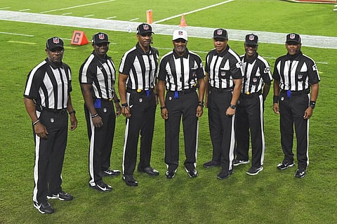 NFL officials pose for a photo before an NFL football game between the Tampa Bay Buccaneers and the Los Angeles Rams Monday, Nov. 23, 2020, in Tampa, Fla. (Photo | AP)