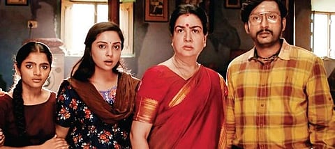Smruthi Venkat (Second Left)  in a still from 'Mookuthi Amman;.
