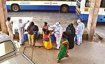 Health workers collect swab samples at Kempegowda Bus Station | Shriram BN