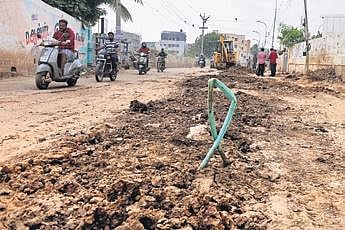 Dug-up road invites muddy mishaps
