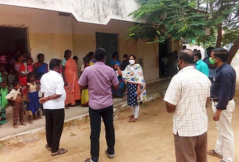 Government officials inspecting the arrangements at a temporary shelter in Tiruvannamalai district (Photo | Express)