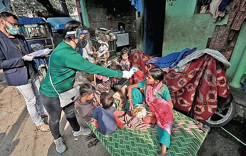 A door-to-door survey is underway at New Delhi’s Raghubir Nagar slum area to assess the coronavirus situation. (Photo | Shekhar Yadav, EPS)