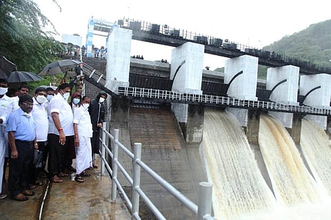 Shenbagathope dam was opened by TN HR&CE Minister Sevoor S Ramachandran to discharge 6000 cusecs of water as the reservoir was receiving continuous inflow (Photo | Express)