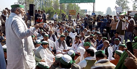Bharatiya Kisan Union leader Rakest Singh Tikait addresses the farmers gathered at the National Highway 58, in Muzaffarnagar, Friday, Nov. 27, 2020. (Photo | PTI)