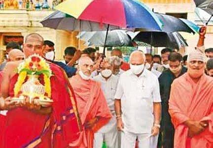 Taking a short break from the pressures of cabinet expansion, Chief Minister BS Yediyurappa spends some time at Male Mahadeshwara Swamy temple in Chamarajanagar district, on Thursday  | Express