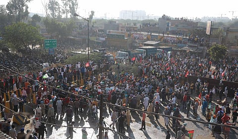 Members of various farmer organisations attempt to cross Singhu Border during Delhi Chalo protest march against the new farm laws in New Delhi. (Photo | Shekhar Yadav, EPS)