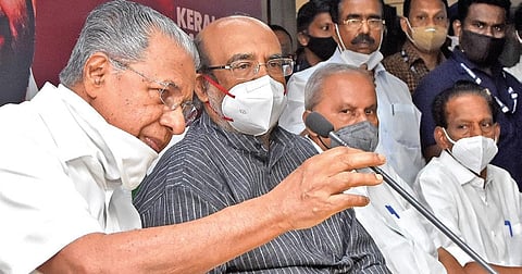 Chief Minister Pinarayi Vijayan at the function in which the newly elected director board members of the Kerala Bank assumed office in Thiruvananthapuram on Friday. Finance Minister Thomas Isaac, Kera