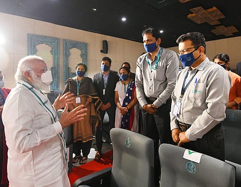 PM Modi at the Bharat Biotech facility at Hyderabad where he interacted with scientists & company heads regarding the Covaxin vaccine against COVID-19 (Photo | Special arrangement)
