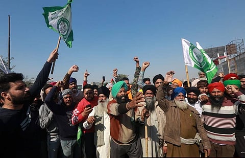 Farmers shouting slogans during their Delhi Chalo protest against Centres new farm laws at Singhu Border in New Delhi on Saturday. (Photo | Shekhar Yadav/EPS)