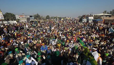 Farmers raise slogans during their Delhi Chalo protest against Centres new farm laws at Singhu Border in New Delhi. (Photo | Shekhar Yadav, EPS)