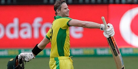 Australia's Steve Smith celebrates after scoring a century during the ODI match against India at the Sydney Cricket Ground. (Photo | AP)