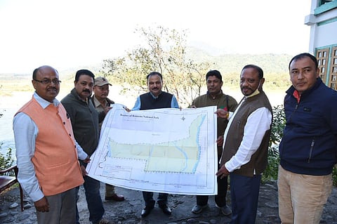 Minister Parimal Suklabaidya, second from right, unveiling the map of proposed Raimona National Park. (Photo | Special arrangement)
