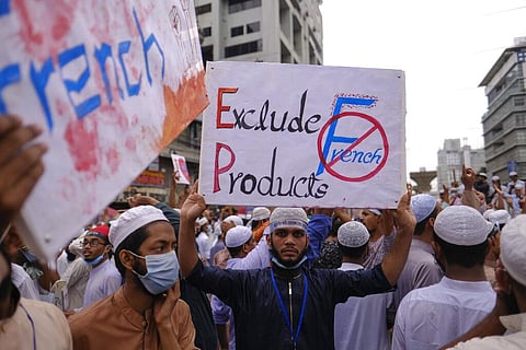 Bangladeshi Muslims protesting the French president’s support of secular laws allowing caricatures of the Prophet Muhammad. (Photo | AP)