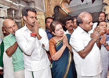 Former CM HD Kumaraswamy with his son Nikhil and wife Anita
