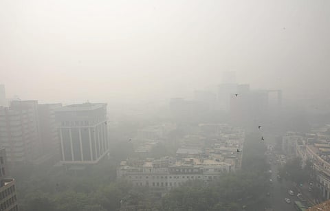 Buildings are seen shrouded in smog in New Delhi. (Photo | Shekhar Yadav, EPS)